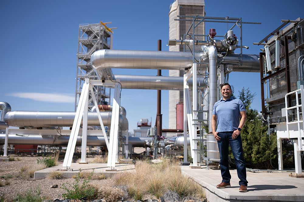 Images of Principal Investigator Ken Armijo standing by the Molten Salt Test Loop at the National Solar Thermal Test Facility in Albuquerque, NM.