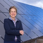 Amy Halloran shows off one of Sandia’s solar research projects. Amy’s mentoring activities were recognized by the New Mexico Technology Council.