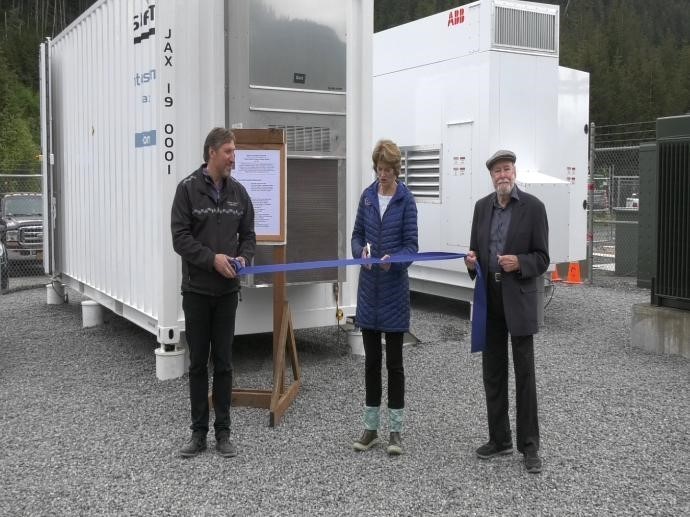 Alaska Sen. Lisa Murkowski and energy leaders cut the ribbon to commemorate the new battery energy storage system in Cordova, Alaska. Joining Sen. Murkowski are Imre Gyuk, right, program director for the DOE’s Office of Electricity Delivery & Energy Reliability Stationary Energy Storage Program, and Clay Koplin, CEO of Cordova Electric Cooperative. (Photo provided by Dan Borneo)