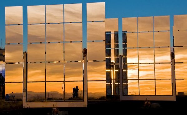 Image of large solar mirror at the National Solar Thermal test Facility in Albuquerque, NM