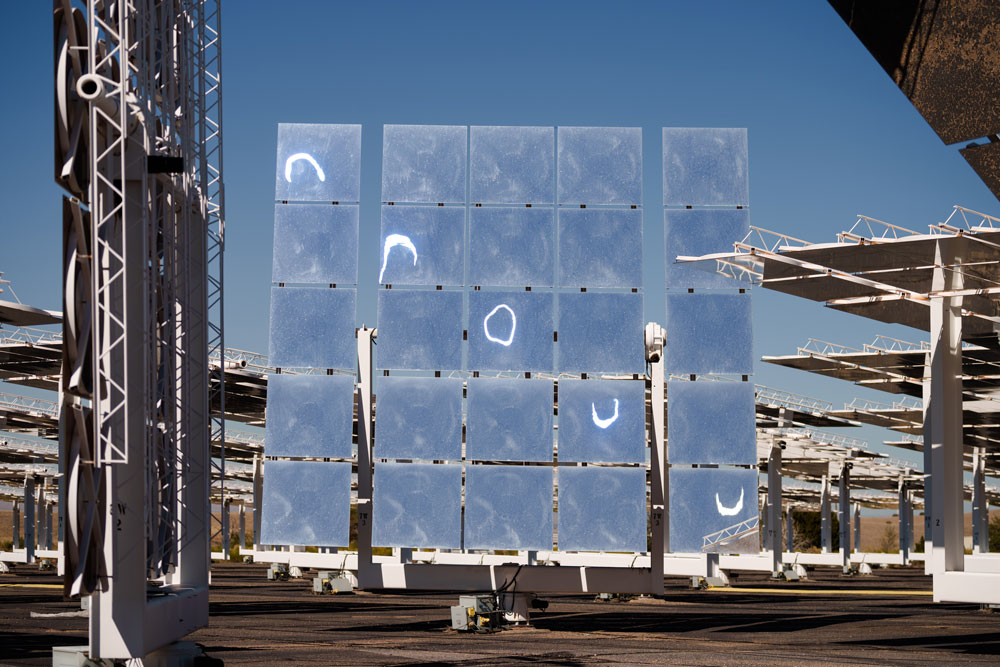 a mirrored heliostat reflects the phases of the 2023 solar eclipse.