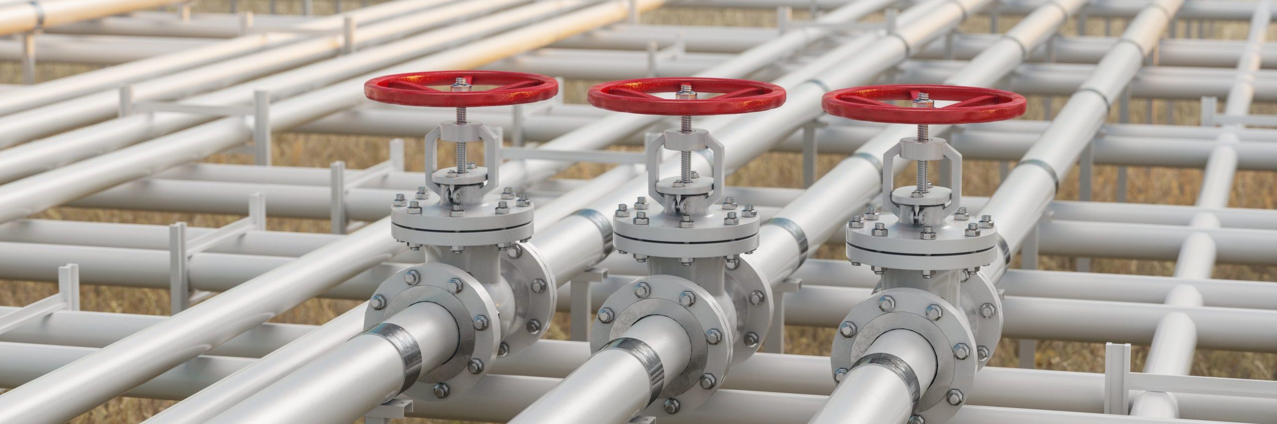 Oil, Gas Or Water Transportation With Pipe Line Valves On Soil With Defocused Background