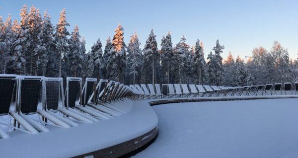 Researchers attending the 2024 High Latitude PV Workshop in Sweden March 14-15, 2024, visited the Solvåg (Solar Wave) system in Piteå. (Photo by Joshua Stein)
